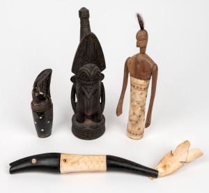 Four assorted tribal artefacts, carved wood, bone and horn with hair decoration, Papua New Guinea and Southeast Asian origin, the largest 31cm long