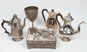 A Japanese white metal jewellery casket with eagle top; together with an antique silver plated Australian trophy cup "Sale Swimming Club, 1872. All Comers. J. Thomson." and three silver plated tea and hot water pots, mixed vintages, (5 items), ​​​​​​​the 
