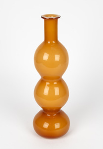 A vintage amber cased glass bottle vase, 37.5cm high