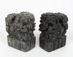 A pair of Chinese carved soapstone foo dog statues, 20th century, 15cm high