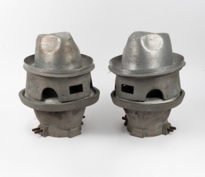 HAT MOULDS: A pair of vintage two piece cast metal examples, early to mid 20th century