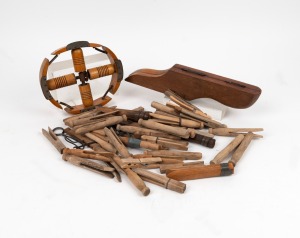 Antique peg collection; together with an antique boot jack and adjustable timber hat last, 19th century