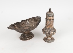 An antique sterling silver sugar caster, together with an antique sterling silver bonbon dish with repousse decoration, (2 items), the caster 22cm high, 5.7 grams total.
