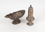 An antique sterling silver sugar caster, together with an antique sterling silver bonbon dish with repousse decoration, (2 items), ​​​​​​​the caster 22cm high, 5.7 grams total.
