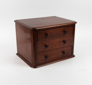 An Australian cedar three drawer miniature chest, 19th century. (Most likely stud drawers from a dressing table). 28cm high, 38cm wide, 28cm deep