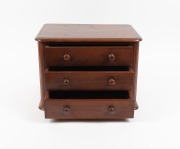 An Australian cedar three drawer miniature chest, 19th century. (Most likely stud drawers from a dressing table). 28cm high, 38cm wide, 28cm deep - 2