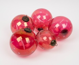 Five assorted vintage cranberry glass baubles with engraved decoration, 20th century, the largest 16cm high overall.