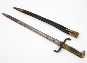 A German WWI period bayonet in leather scabbard, 55cm long