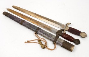 A pair of vintage Chinese butterfly swords, shagreen and brass scabbard,69cm long overall in the scabbard. LICENCE REQUIRED BY VICTORIAN BUYERS