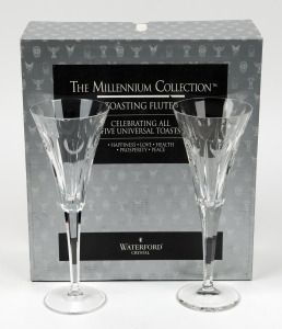 WATERFORD "The Millennium Collection" pair of crystal champagne flutes in original box of issue, acid etched "Waterford", 23.5cm high