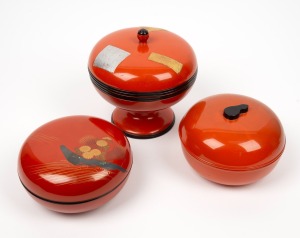 Three vintage Japanese circular orange lacquered boxes, early to mid 20th century, ​​​​​​​the largest 18cm high.