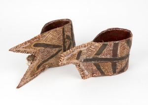A pair of tribal armbands, hand-painted natural earth pigment on bark with fibre and feather, unknown origin, 17cm wide