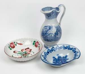 An antique English blue and white transfer porcelain wash jug; together with a tin glazed earthen ware fruit bowl and a blue and white porcelain barbers bowl, 19th/20th century, (3 items), the jug 33cm high