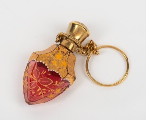 60 · MOSER antique Bohemian ruby glass chatelaine scent bottle with gilt and enamel decoration, 19th century, the bottle 5cm high, 8cm high including loop