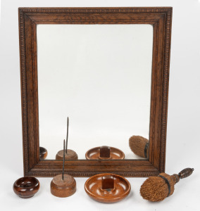 A vintage Australian Tasmanian oak framed mirror, a blackwood dish, a mulga wood bowl, a treen ware antique brush and a document spike, 19th and 20th century, (5 items), the mirror 44 x 51cm overall