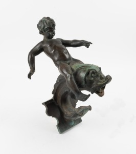 An antique bronze cherub and dolphin fountain wall font, 19th/20th century, 44cm high.