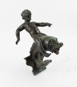 An antique bronze cherub and dolphin fountain wall font, 19th/20th century, 44cm high.