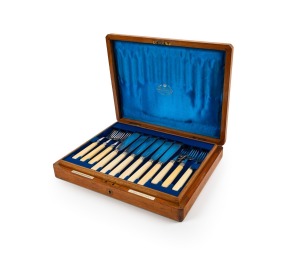 An antique English fish cutlery set with bone handles by Goldsmiths & Silversmiths Company of London, setting for twelve in original oak canteen, 19th/20th century, the canteen 36cm wide