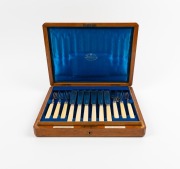 An antique English fish cutlery set with bone handles by Goldsmiths & Silversmiths Company of London, setting for twelve in original oak canteen, 19th/20th century, the canteen 36cm wide - 2