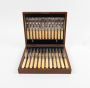 An antique English fish cutlery set for twelve in original canteen, with silver plated blade and ivory handles; together with a boxed set of fish servers with bone handles, 19th/20th century, (2 items) - 2