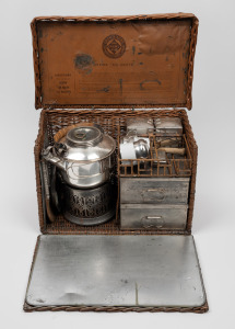 DREW & SONS "Brews en Route Teabaskets" automotive travelling picnic set with maker's plaque and lithograph leather label inside the lid, circa 1920, 26cm high, 39cm wide, 24cm deep
