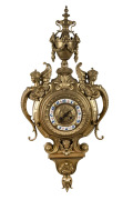 Antique French cartel clock in cast brass case with applied enamel Arabic numerals, time and strike movement, 19th century, ​​​​​​​81cm high overall.