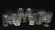 A group of assorted antique and vintage drinking glasses, including engraved and faceted examples etc., 18th/19th/20th century, (17 items), the largest 16cm high