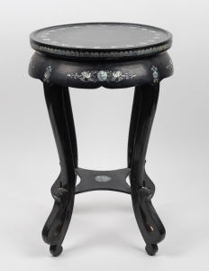 A vintage Chinese black lacquered circular occasional table with mother of pearl inlay, 20th century, 89cm high, 38cm diameter.
