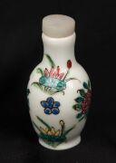 Four antique and vintage porcelain snuff bottles with hand-painted enamel decoration, 19th/20th century, the largest 8cm high - 10