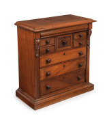 An antique Australian ceder apprentice chest of nine drawers with carved corbels circa 1875, 47cm high, 45cm wide, 23cm deep.