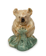 REMUED rare pottery koala bookend modeled by CASTLE HARRIS, incised "Remued, 339", 15cm high