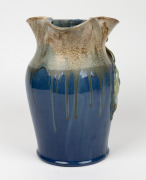 REMUED blue and green glazed pottery jug with applied gumnuts and leaves, incised "Remued, 54M", 26cm high - 2