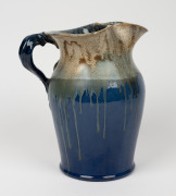 REMUED blue and green glazed pottery jug with applied gumnuts and leaves, incised "Remued, 54M", 26cm high - 3