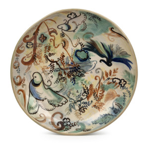 JOHN PERCEVAL and ARTHUR MERRIC BOYD Murrumbeena pottery fruit bowl painted with wildflowers, ferns and birds, incised "Perceval, Arthur Merric Boyd", 29.5cm diameter