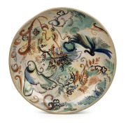 JOHN PERCEVAL and ARTHUR MERRIC BOYD Murrumbeena pottery fruit bowl painted with wildflowers, ferns and birds, incised "Perceval, Arthur Merric Boyd", 29.5cm diameter