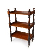 An antique Australian cedar three tier dumbwaiter with turned column supports and ring turned decoration, circa 1875, unusually small proportions of 126cm high, 81cm wide, 45cm deep