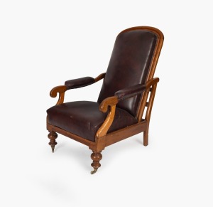 An antique Australian cedar reclining armchair with burgundy leatherette upholstery, 19th century, 115cm high, 75cm wide, 95cm deep