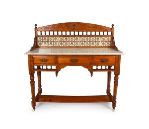 An antique Australian huon pine washstand with marble top and floral tile back, 19th century, 116cm high, 122cm wide, 50cm deep