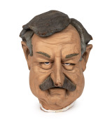 Original 1988 Ross Oakley caricature dummy that featured during episodes of the 'Rubbery Figures' television series, which screened in various forms from 1984 to 1990. Accompanied by a 24 x 24cm framed photograph from June 1988 when Oakley was awarded an 
