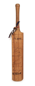 A miniature cricket bat signed by numerous Australian test team players, including Bradman, Gregory, Fingleton, Brown, Jackson, Hassett, O' Reilly, Rigg, and others. Oakley's father was a close friend of Ross Gregory, and chose to name his son after the n
