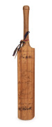A miniature cricket bat signed by numerous Australian test team players, including Bradman, Gregory, Fingleton, Brown, Jackson, Hassett, O' Reilly, Rigg, and others. Oakley's father was a close friend of Ross Gregory, and chose to name his son after the n