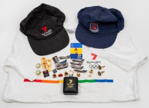 SYDNEY 2000 OLYMPICS: Group of thirty promotional items, including Stadium Australia umbrella, two caps, one t-shirt, one pair of cufflinks, and twenty-four pins including of note several different official airline team partner pins and two Prime Minister