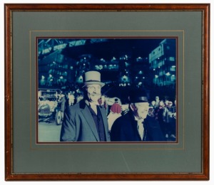 Four framed and glazed images - one showing Ross Oakley and Tim Watson in period garb outside the MCG for the AFL Centenary Re-Enactment match (52 x 45cm overall), one depicting Ross at the launch of the 1991 Foster's Cup at St Kilda Marina with Greg Durh