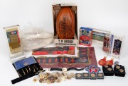 AFL CENTENARY: Group lot of branded items many of which still in packaging, including Sherrin&nbsp;and Faulkner Centenary footballs, umpire's whistle, player's guernsey badge,&nbsp;forty-six pins, women's silk scarf, eight pens, wristwatch, and others. (60+ items)