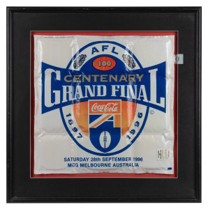 AFL CENTENARY: Framed and glazed inflatable novelty 'Airbox', prominently featuring Centenary logo and date of the match, 62 x 62.5cm overall.