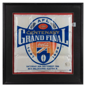 AFL CENTENARY: Framed and glazed inflatable novelty 'Airbox', prominently featuring Centenary logo and date of the match, 62 x 62.5cm overall.