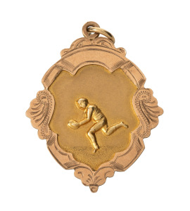 DROUIN FOOTBALL CLUB, award fob in gold (9ct; 3.38g), ring top suspension, reverse inscribed, 'Drouin / Football Club / Awarded to / C.Clifford / Season 1926'.