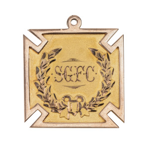 SOUTH GAMBIER FOOTBALL CLUB, award medal, circa 1928, in gold (9ct; 6.34g), by D.H.McDougall, ring top suspension, obverse inscribed, 'S.G.F.C.', reverse inscribed, 'Presented by / E.Hoole. / Best Improved / Player. / Won by / A.Malycha'. Extremely fine c