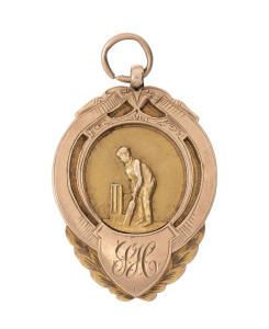 BARRACLUFF CRICKET CLUB, prize fob medal in gold (9ct; 8.98g), by W.Kerr, ring top suspension, obverse inscribed, 'SH', reverse inscribed, 'Barracluff C.C. / Bondi. / Pres. by / Ald. J.T.Barracluff. / For / Best Batting Av'ge. /S.Hews.'. Very fine. Locate