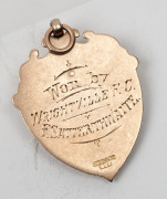 AUSTRALIAN RULES FOOTBALL AWARDS: Cobar District Football Association, prize fob in gold (9ct; 6.29g; 30x36mm), by W. Kerr, ring top suspension, obverse inscribed, 'Cobar Dist. Football Assn./Premiers/1918', reverse inscribed, 'Won by / Wrightville F.C. / - 3